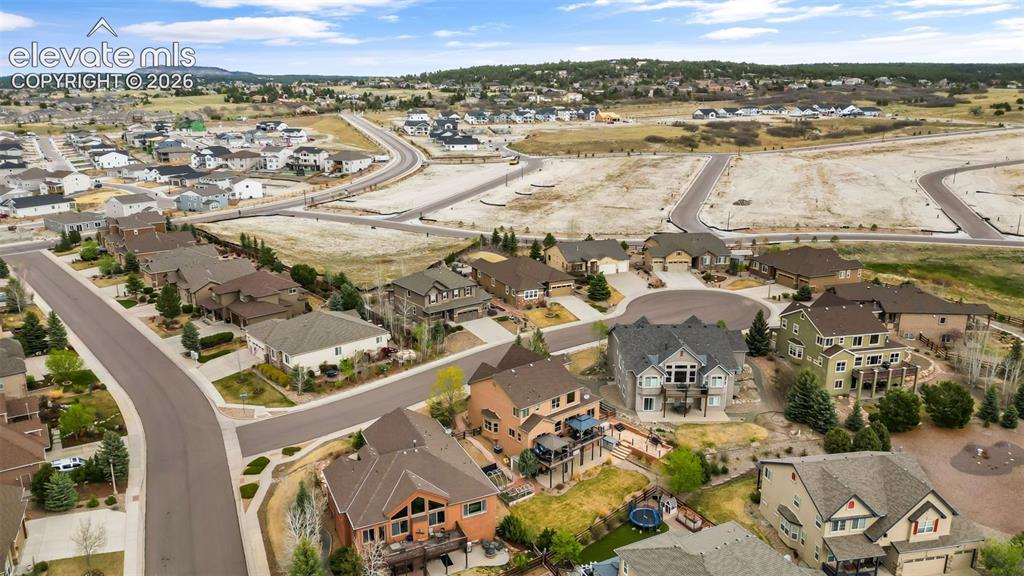 Image 48 of 50: Aerial perspective showcasing residential properties with varied architectu