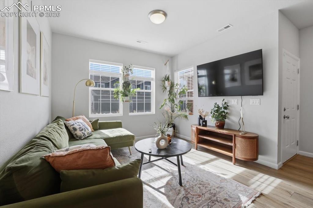 Image 2 of 40: Main level living room.