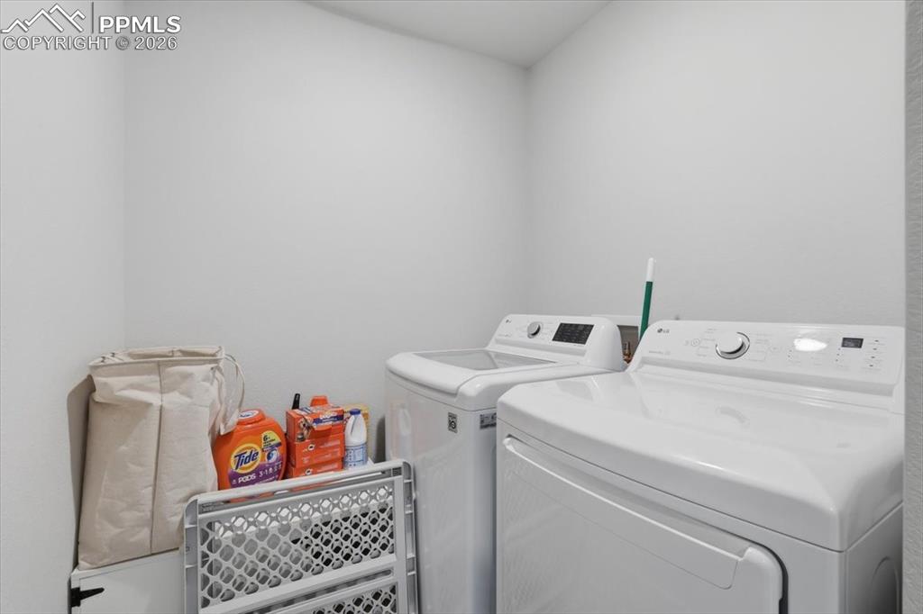 Image 24 of 40: Laundry room upper level.