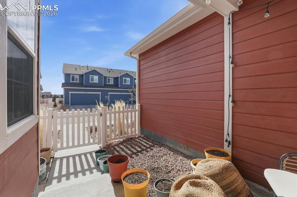 Image 30 of 40: Gated front porch.