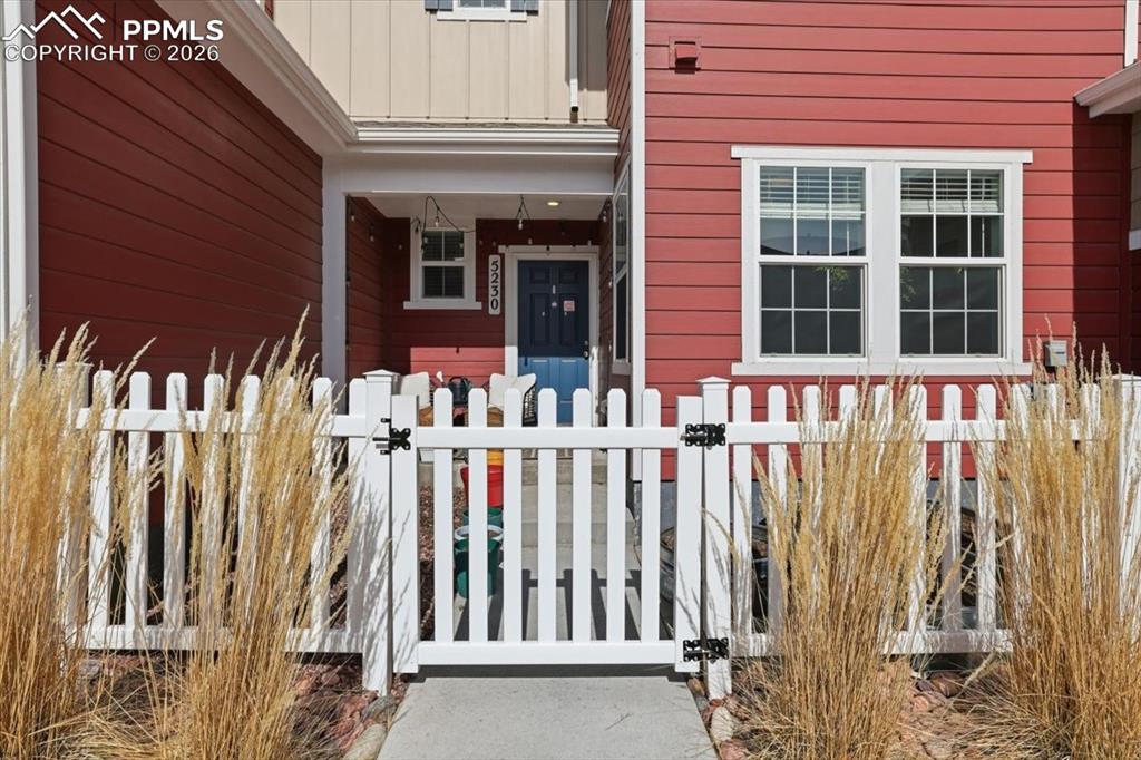 Image 32 of 40: Gated front porch.