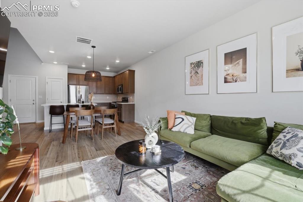 Image 8 of 40: Open main level living.