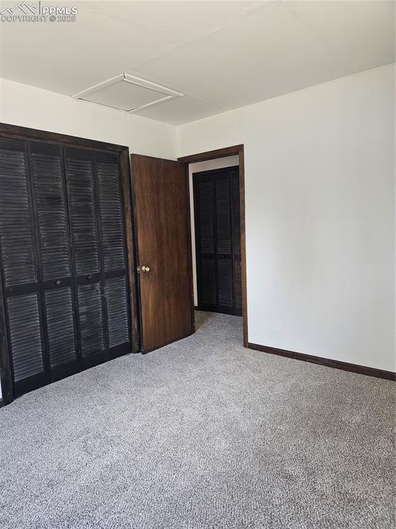 Image 10 of 13: Unfurnished bedroom featuring carpet flooring and a closet