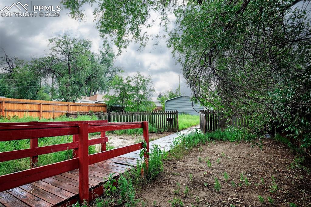 Image 11 of 12: View of backyard