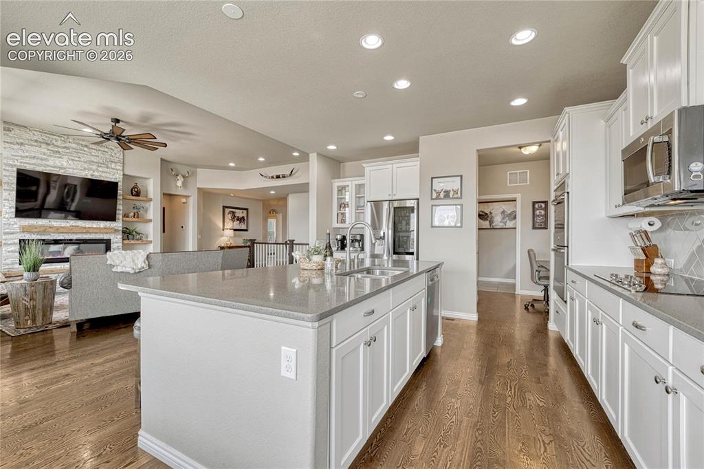 Image 11 of 50: This wide angle highlights how the kitchen serves as the ultimate social hu