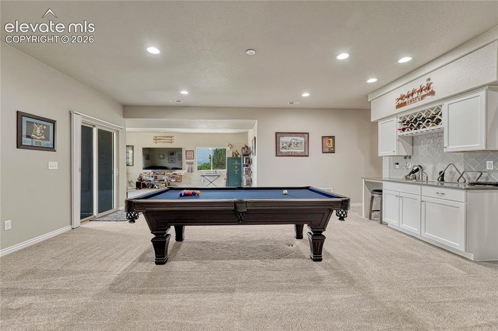 Image 27 of 50: This view highlights the seamless connection between the game room and the