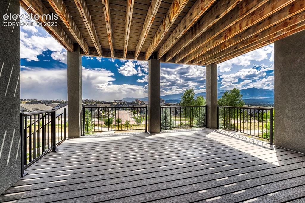 Image 43 of 50: Enjoy quiet evenings on the patio looking out over the professionally lands