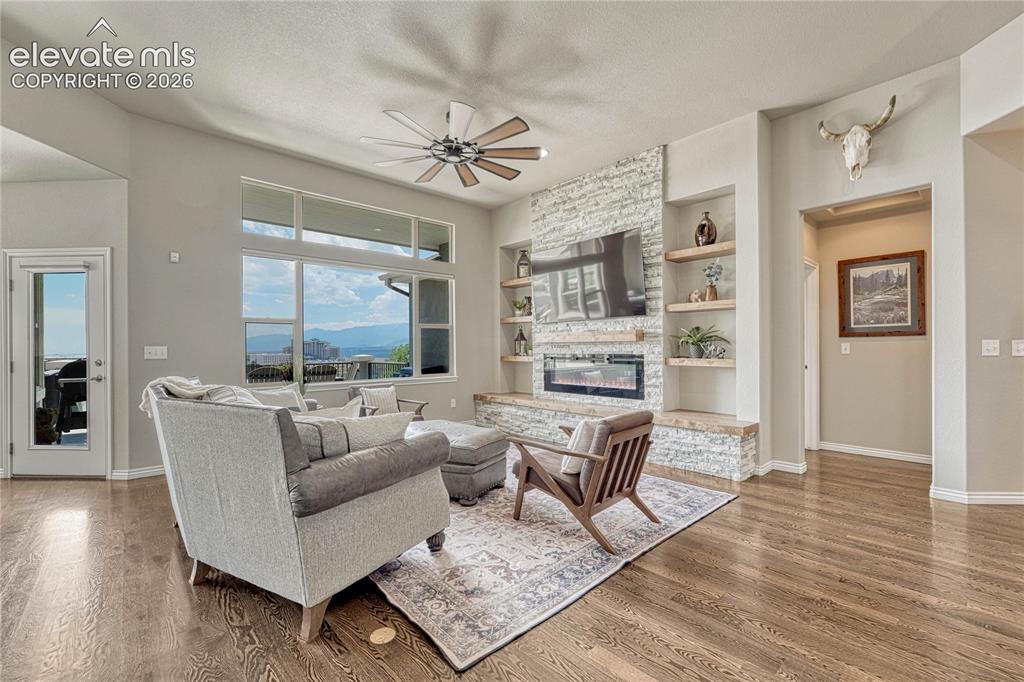 Image 7 of 50: The grand open-concept layout seamlessly connects the great room, gourmet k