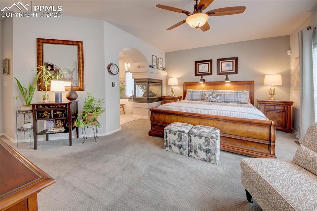 Image 15 of 50: Master bedroom has access to rear deck