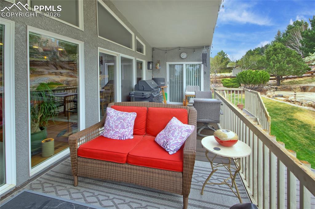 Image 35 of 50: Access to deck from kitchen and master bedroom