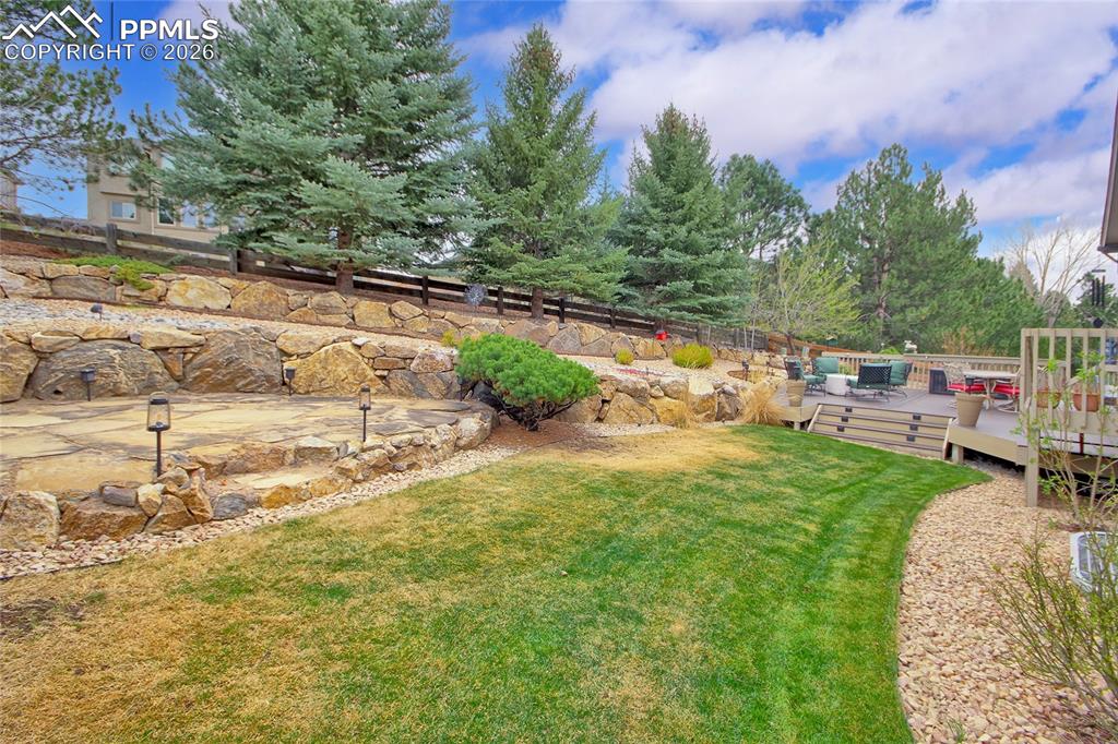 Image 40 of 50: Beautiful terraced landscaping
