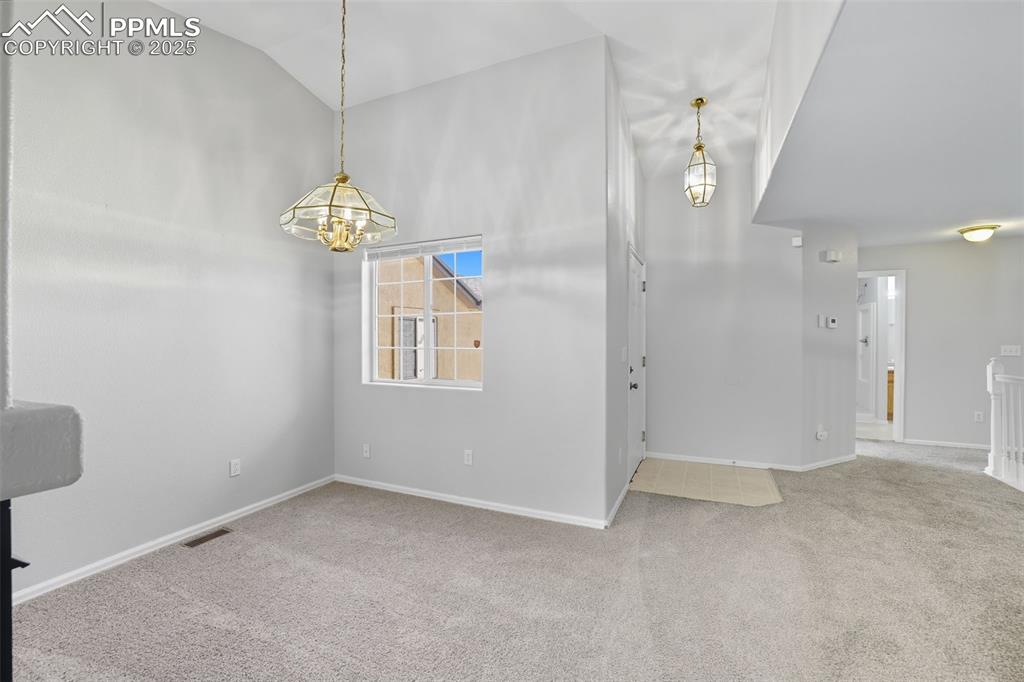 Image 15 of 47: Formal dining area