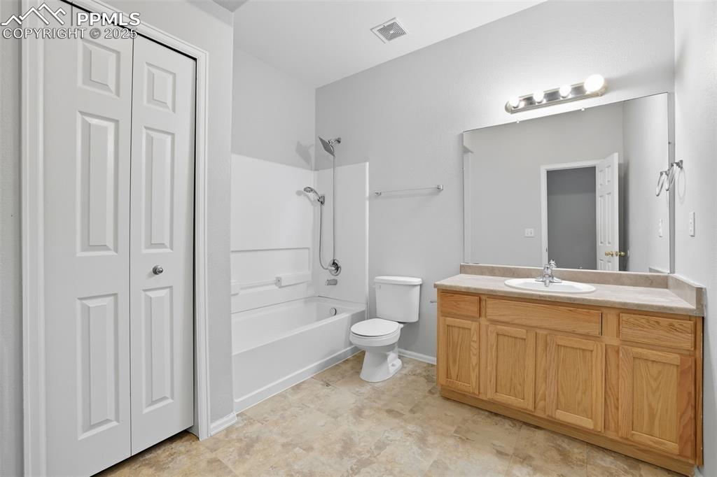 Image 42 of 47: 3rd bathroom featuring bathing tub / shower combination, a linen closet and