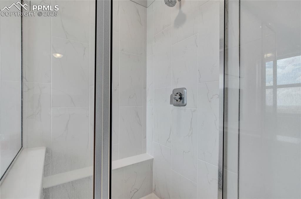Image 25 of 41: Bathroom with a stall shower