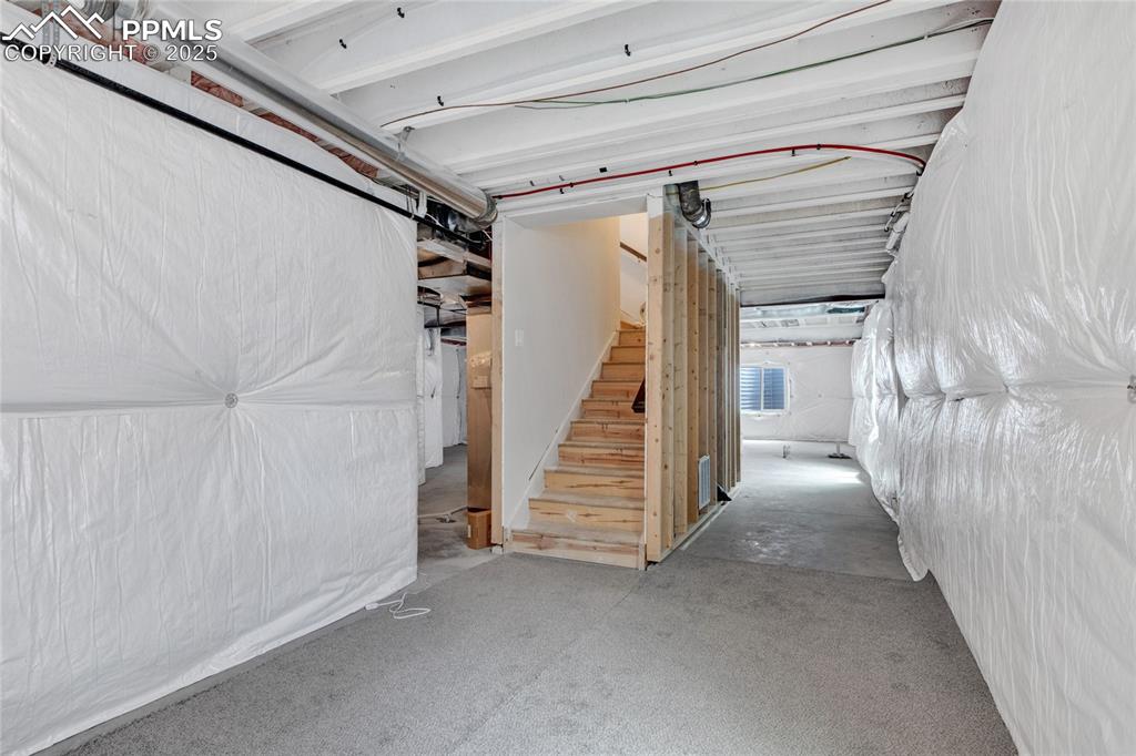 Image 35 of 41: Basement with stairway