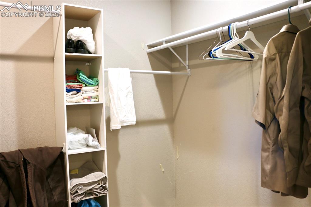 Image 12 of 28: View of walk in closet