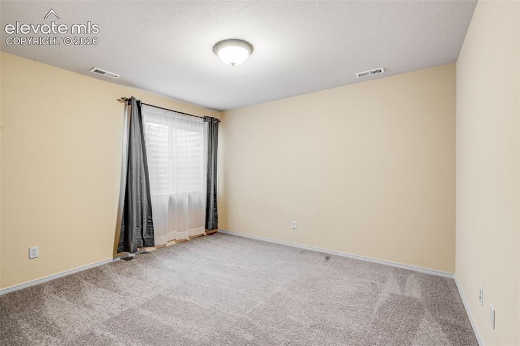 Image 22 of 40: Basement Bedroom 2