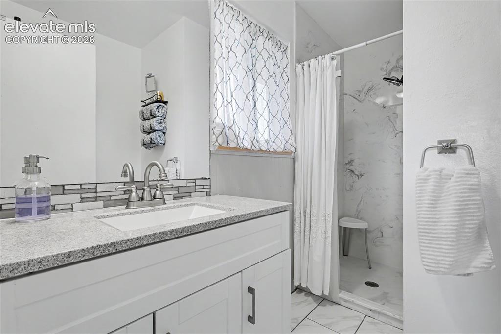 Image 27 of 40: Master Bathroom
