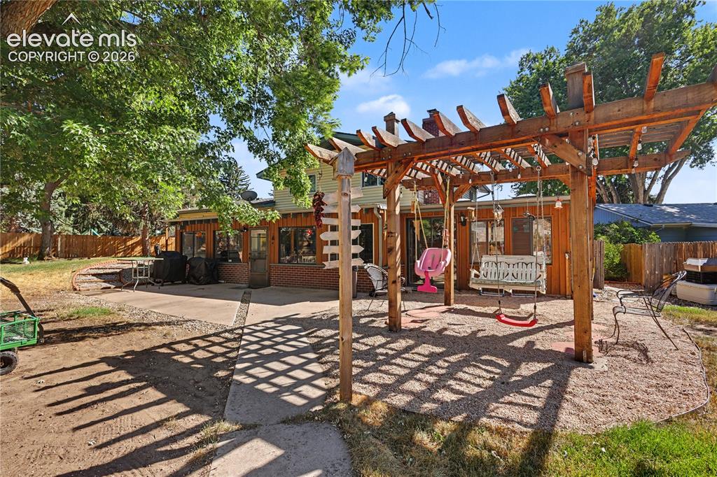 Image 37 of 40: backyard pergola