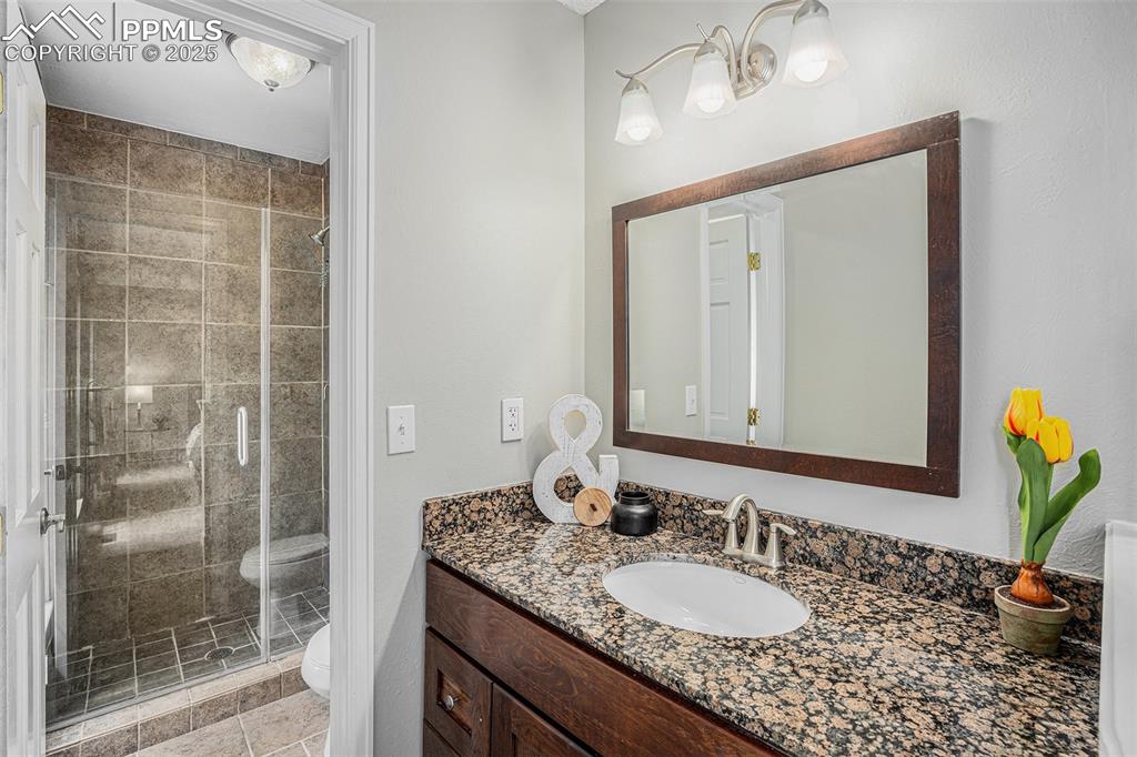 Image 19 of 34: Master bath with walk in shower
