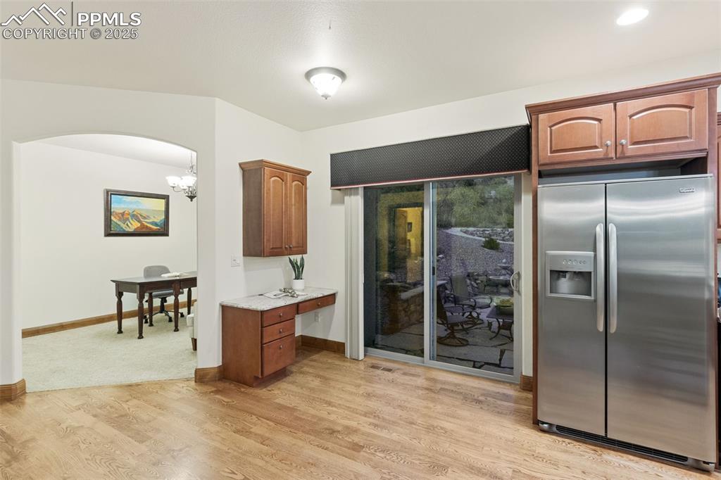 Image 16 of 47: Casual dining space adjacent to office area (or could be formal dining room