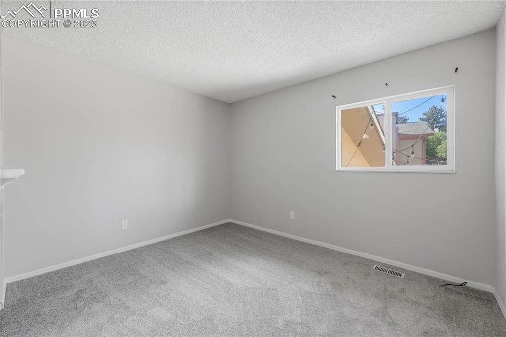 Image 32 of 47: 3rd main level bedroom.