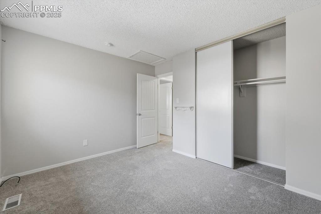 Image 33 of 47: 3rd main level bedroom.