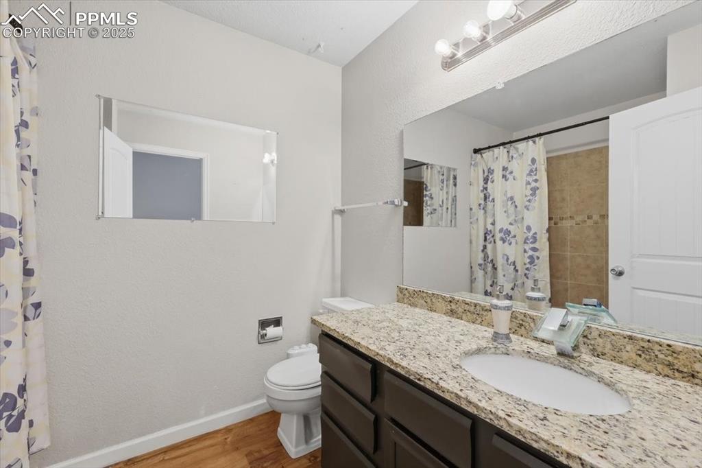 Image 34 of 47: Main level bathroom.