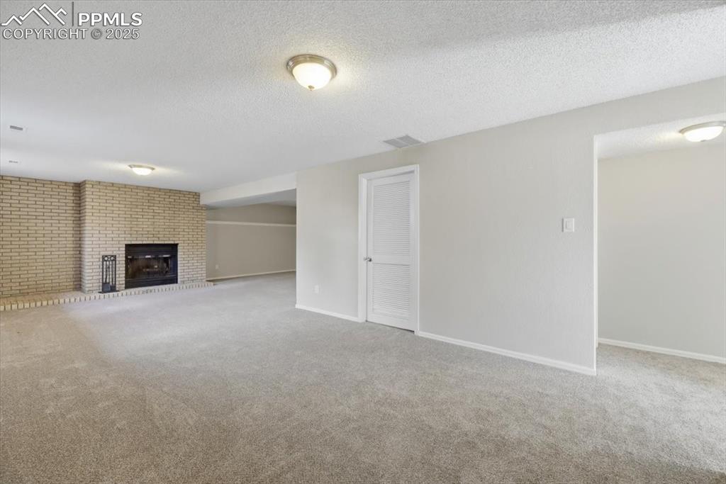 Image 36 of 47: Huge lower level family room.