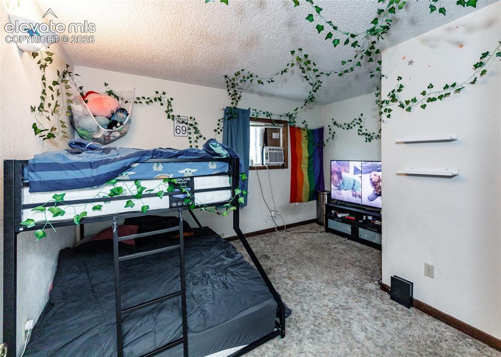 Image 13 of 39: Master Bedroom