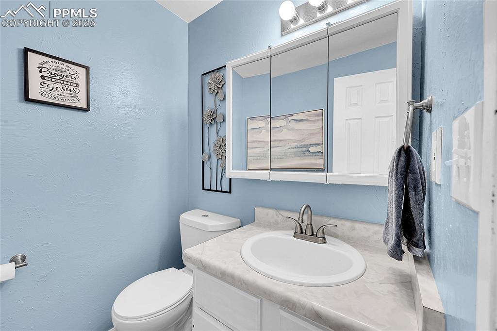 Image 10 of 30: Main level 1/2 bath. 