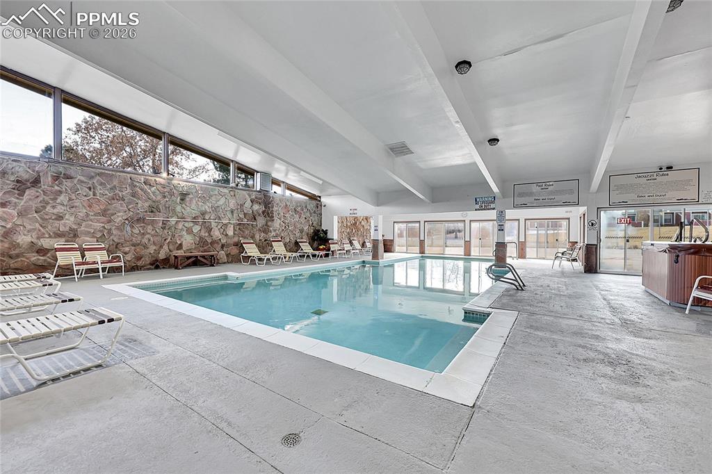 Image 22 of 30: Indoor pool area. 