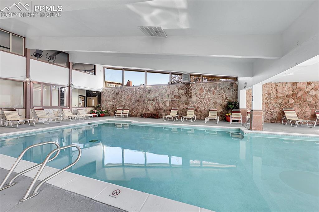 Image 23 of 30: Another view of indoor pool area.