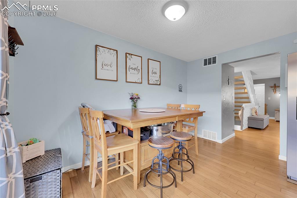 Image 8 of 30: Another view of dining area.