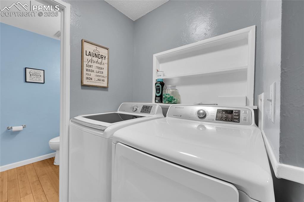 Image 9 of 30: Main level laundry (washer/dryer included).