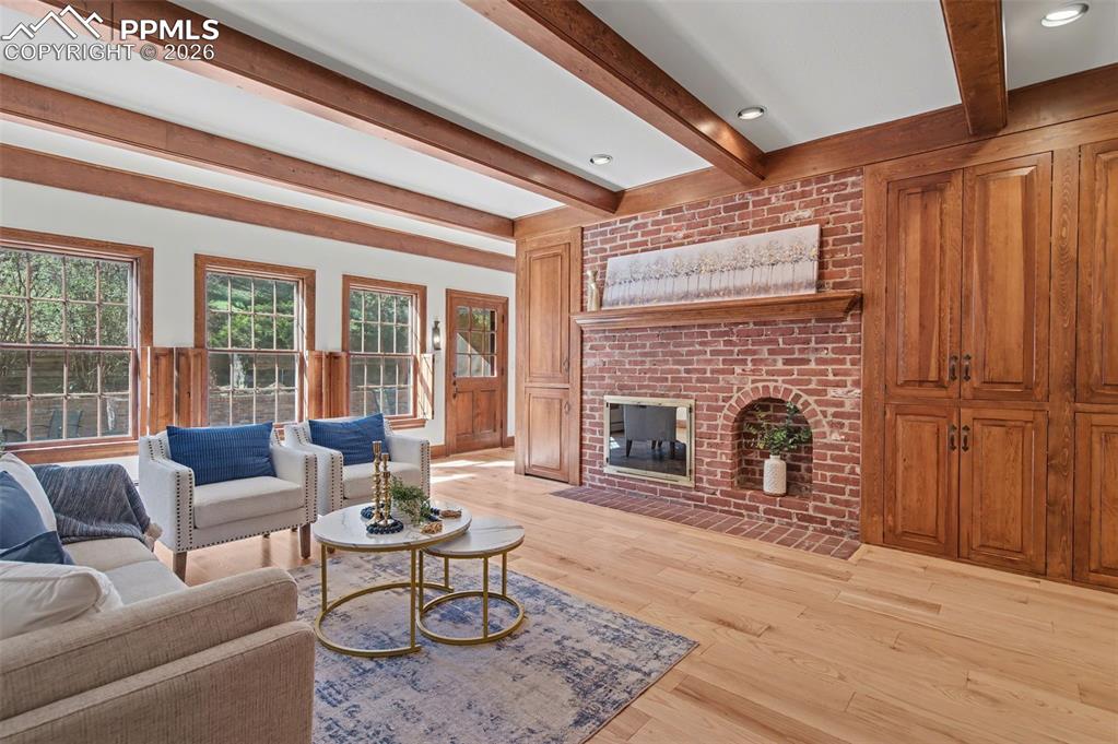 Image 14 of 27: View of fireplace (2 sided) in 2nd living space