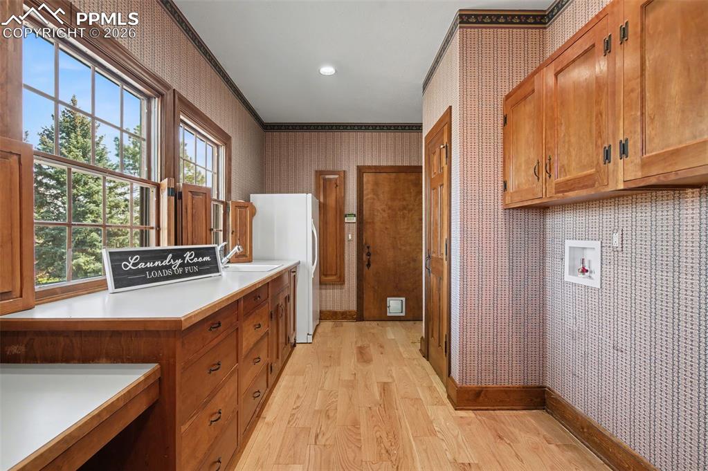 Image 15 of 27: Main level laundry