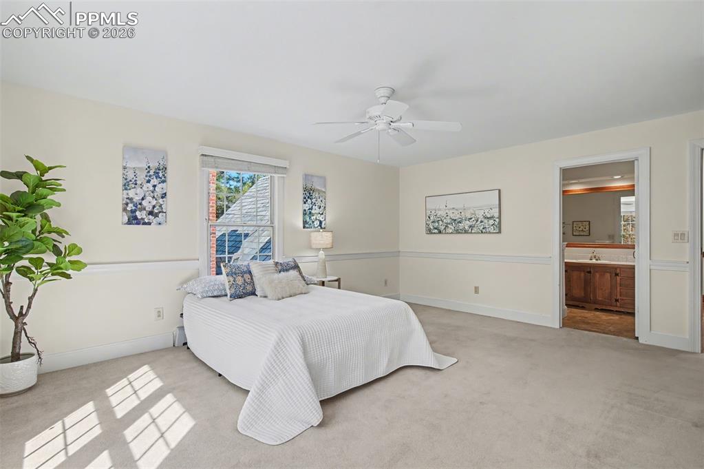 Image 19 of 27: upper bedroom with en suite bathroom