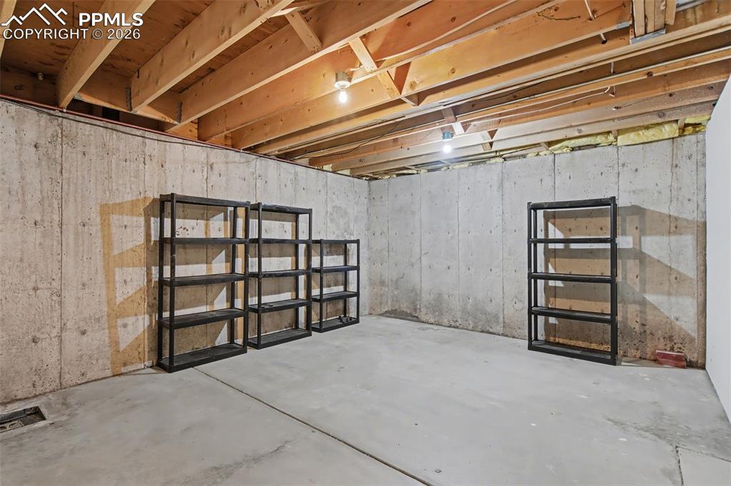 Image 26 of 27: Unfinished basement 2nd storage area