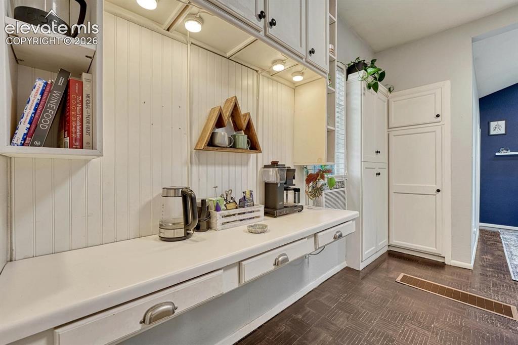 Image 14 of 50: Coffee bar and extra kitchen storage