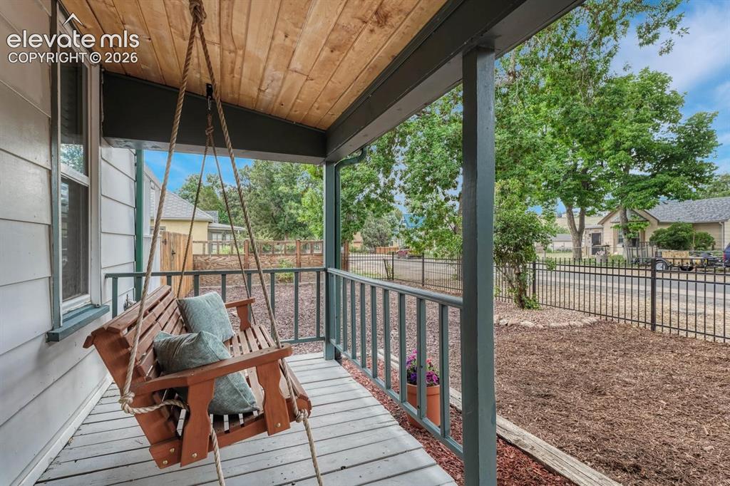 Image 2 of 50: Relax on the front porch swing