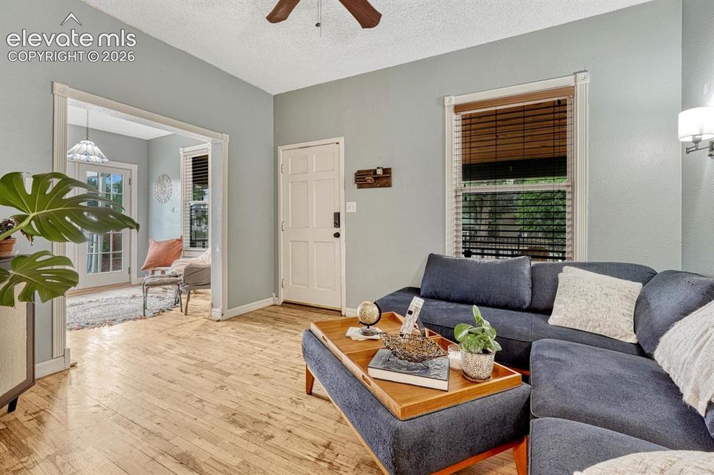 Image 6 of 50: Natural hardwood flooring in the living room