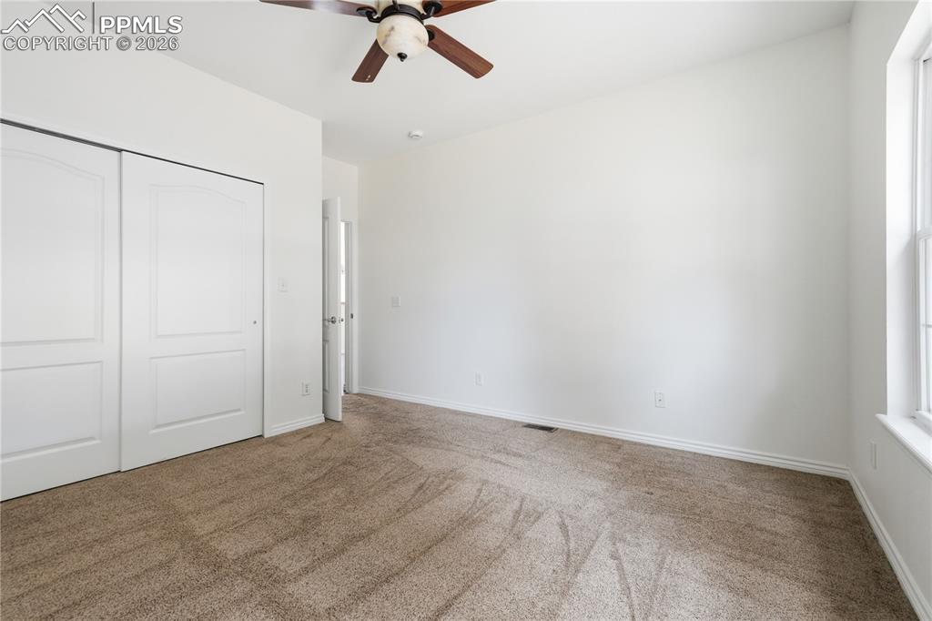 Image 19 of 41: Secondary main level bedroom