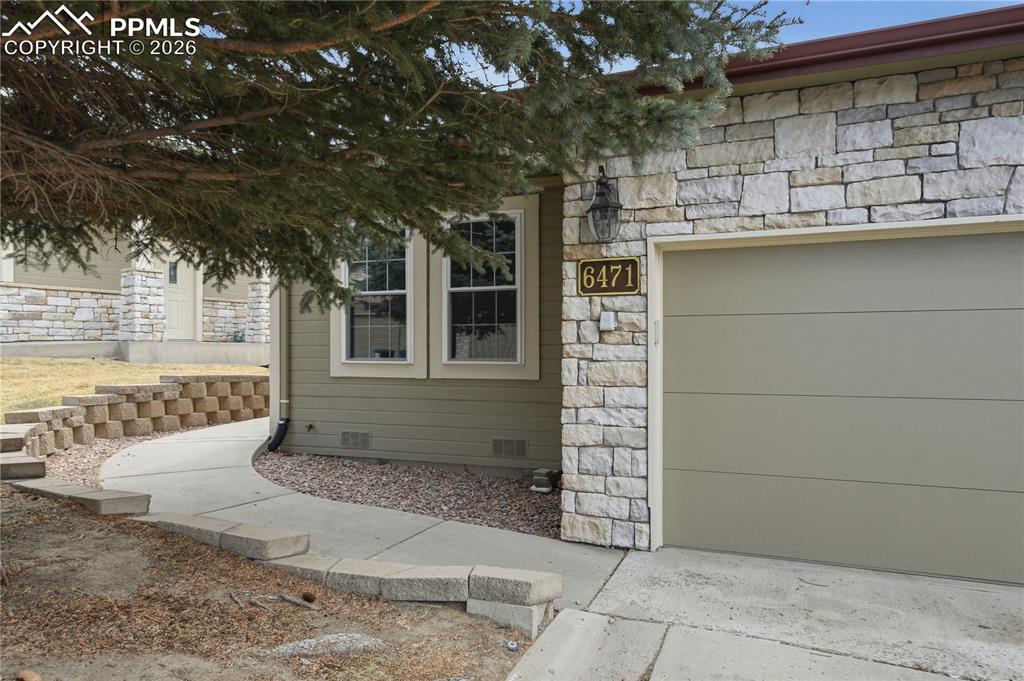 Image 2 of 41: Front walkway to front door