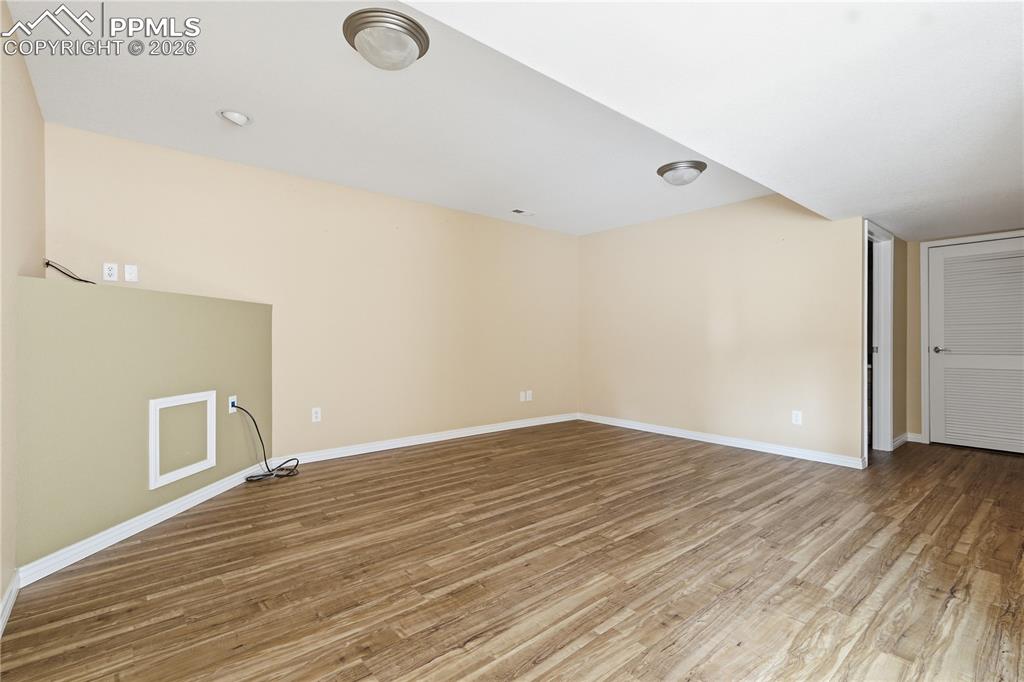 Image 23 of 41: Basement family room