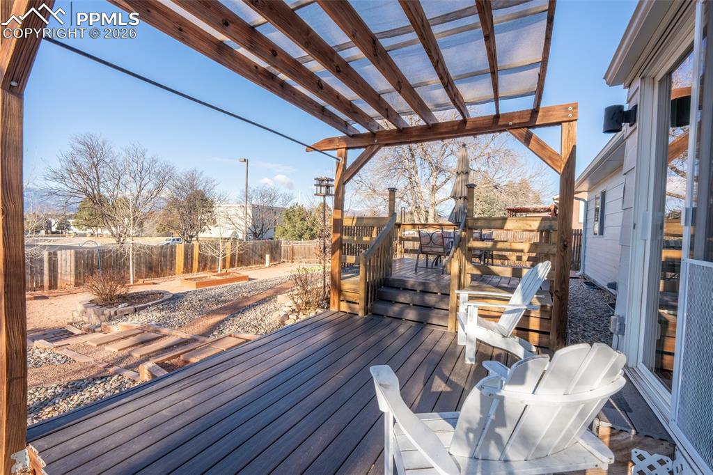 Image 28 of 40: Back deck with mountain views!