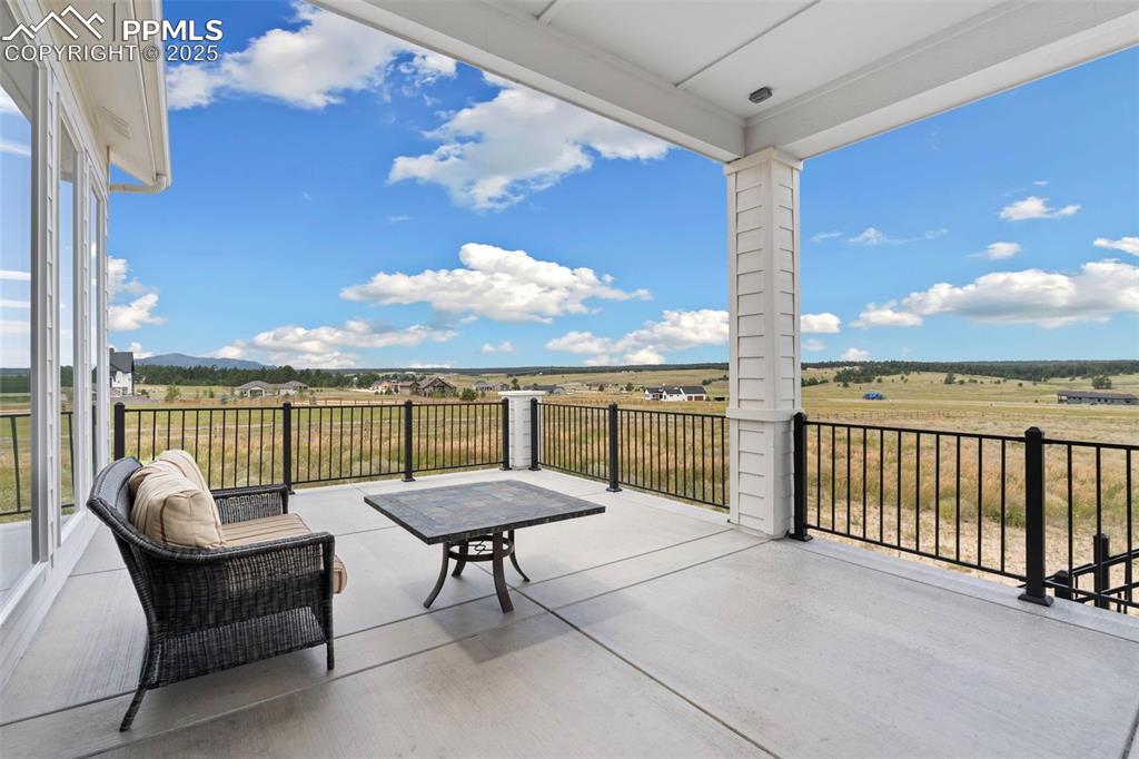Image 47 of 50: View of patio with a view of countryside