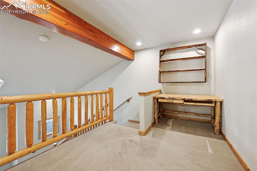 Image 36 of 42: upstairs landing- Desk Stays with Property