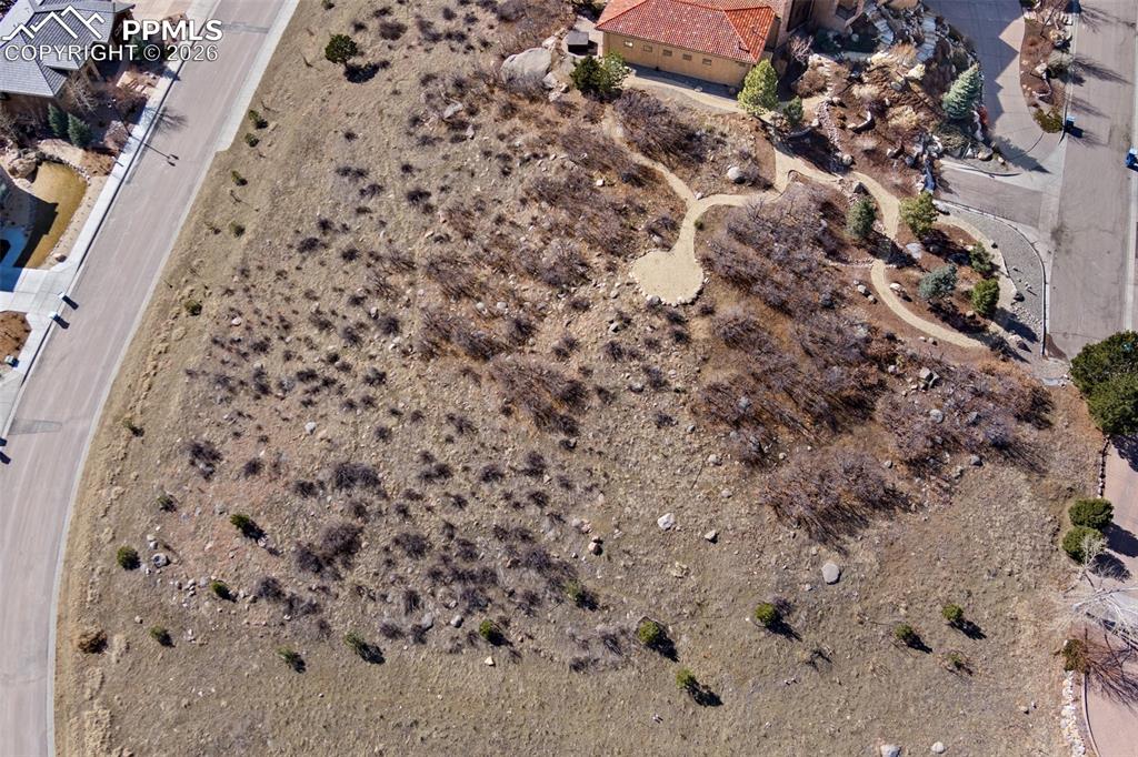 Image 19 of 19: Lot slopes down to allow a walkout building site. building site off San Mar