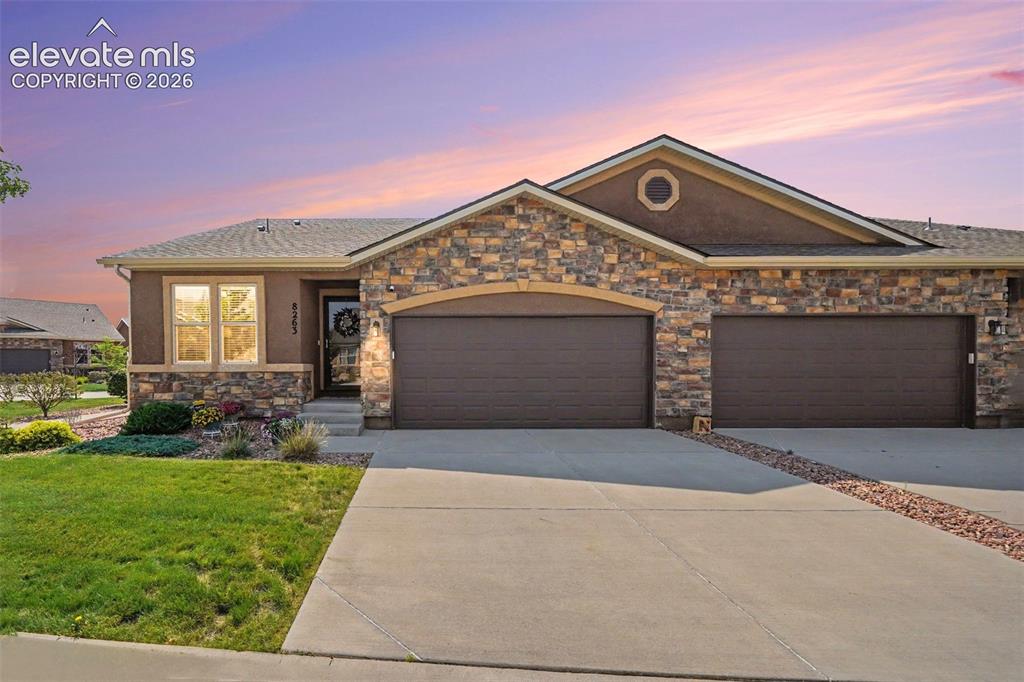 Image 1 of 32: Beautiful stucco and stone exterior with excellent curb appeal